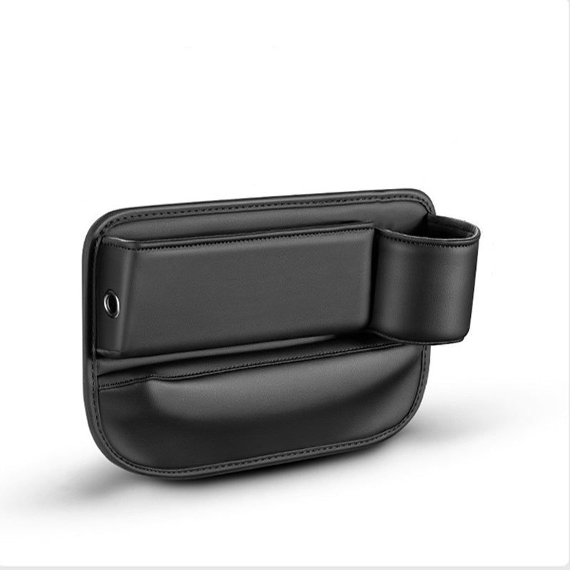 Angled view of a black seat gap organizer showing the cup holder on the right